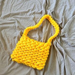 Hand-made yellow crochet bag with plush yarn